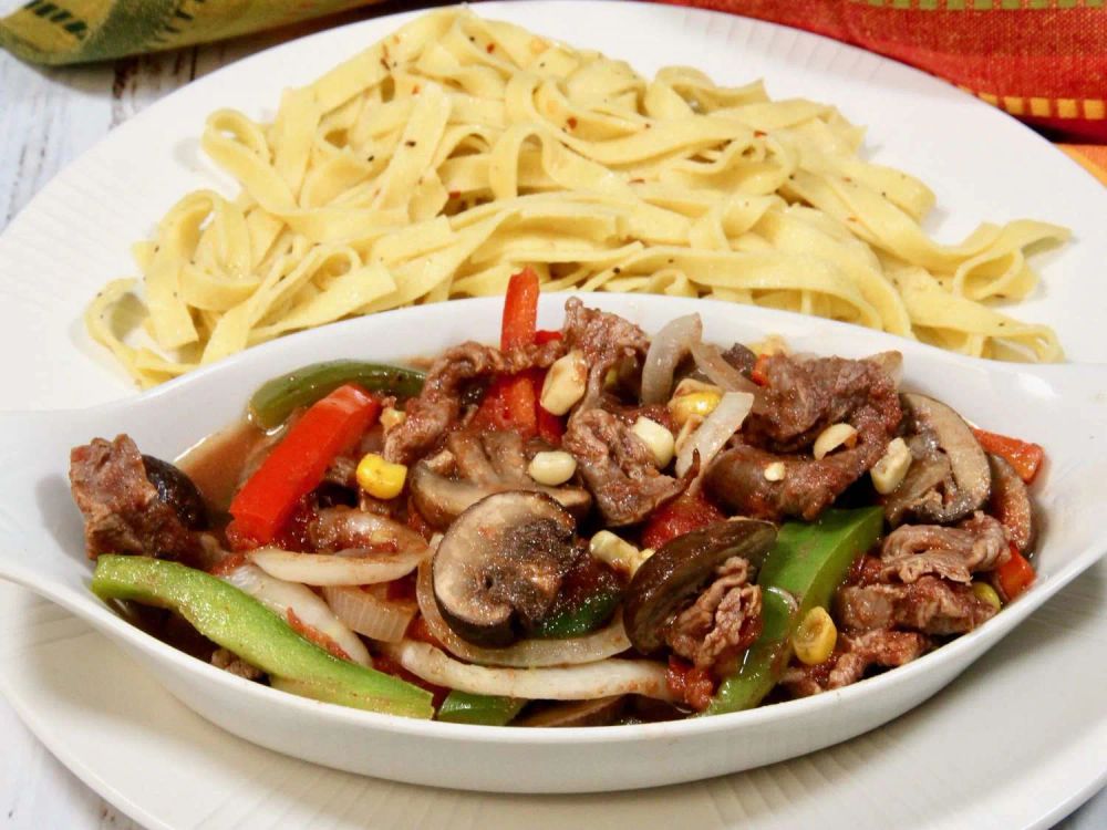 Sliced Steak, Peppers, and Mushrooms in the Oven