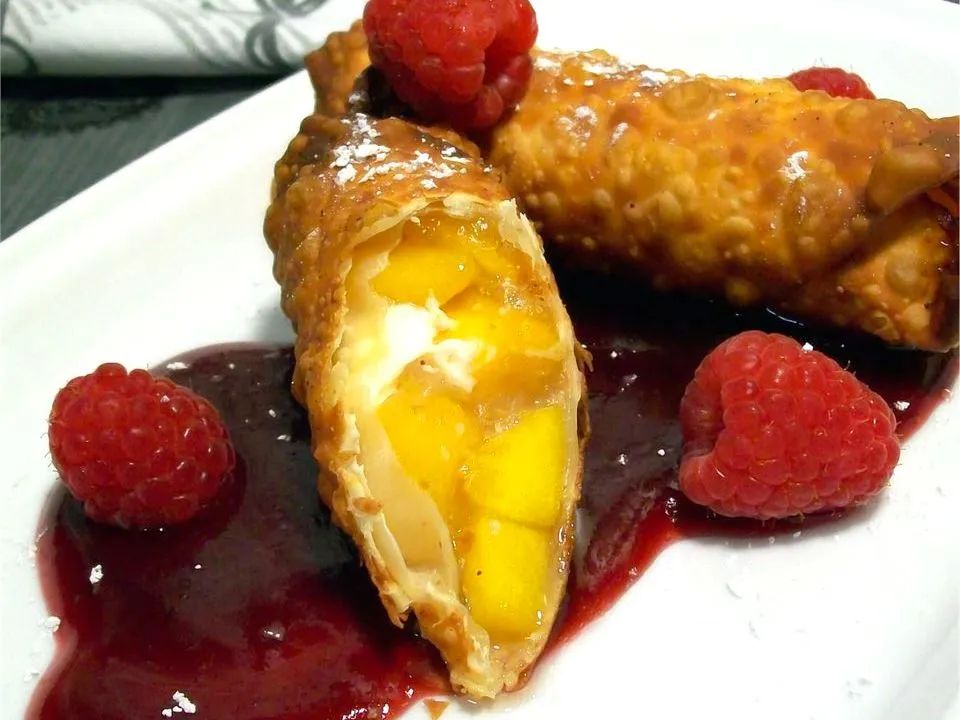 Quick and Easy Peach Pie Egg Rolls with Raspberry Sauce