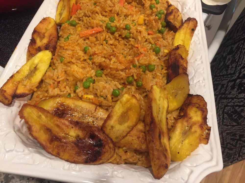 Nigerian Jollof Rice with Chicken and Fried Plantains