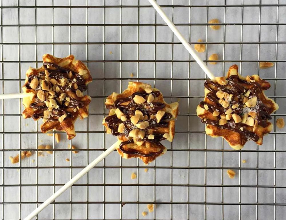 Mini Waffle Pops with Dark Chocolate, Roasted Peanuts, and Flaked Salt