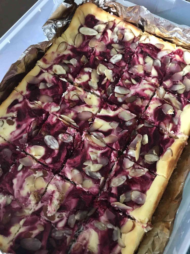 Cranberry Almond Swirl Cheesecake Cookie Bars