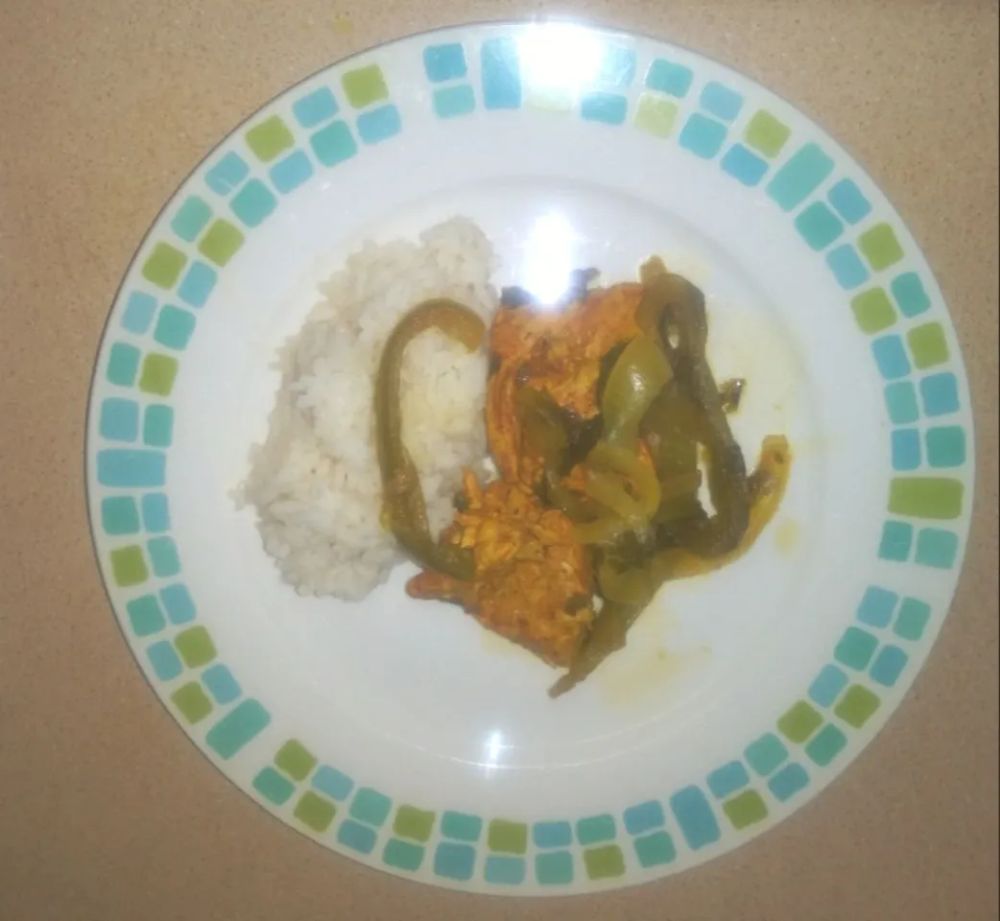 Chicken with Turmeric and Paprika over Rice