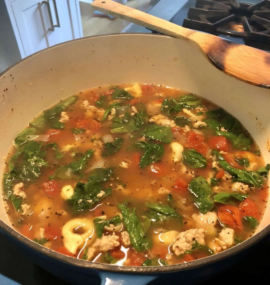 Garlicky Tortellini Soup With Sausage, Tomatoes, and Spinach