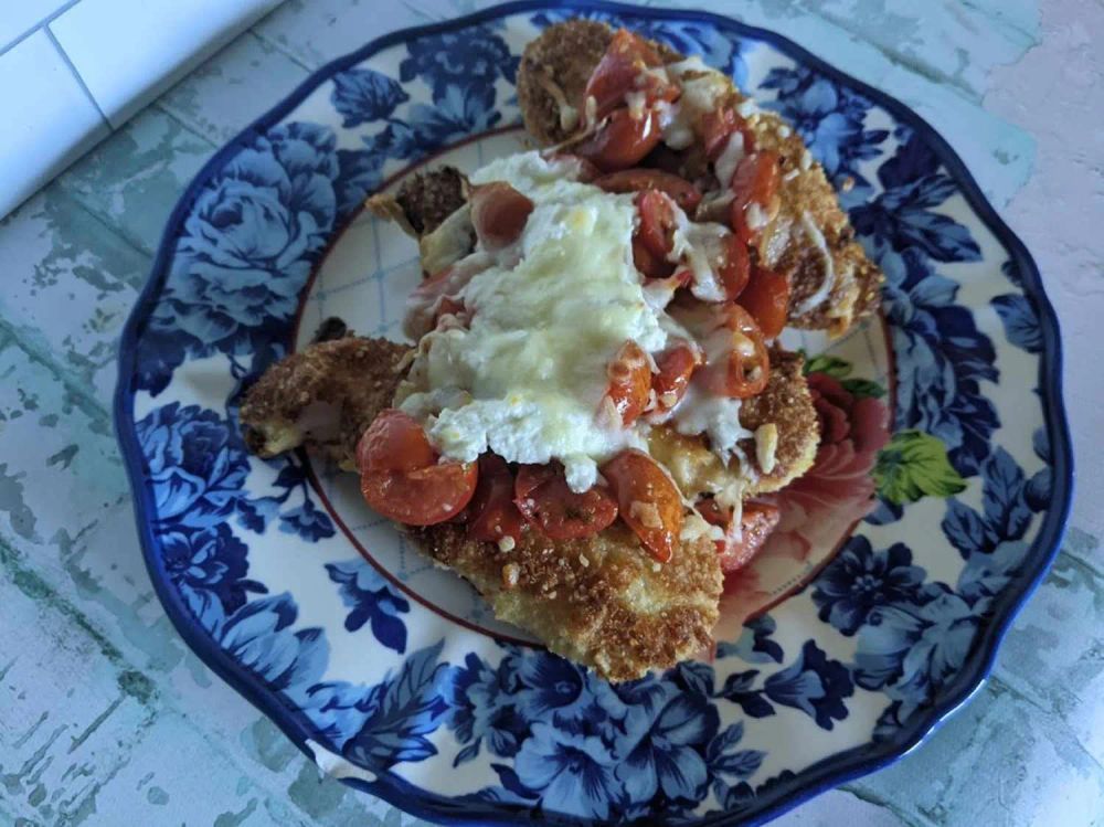 Chicken Escalopes with Cherry Tomatoes, Ricotta, and Mozzarella