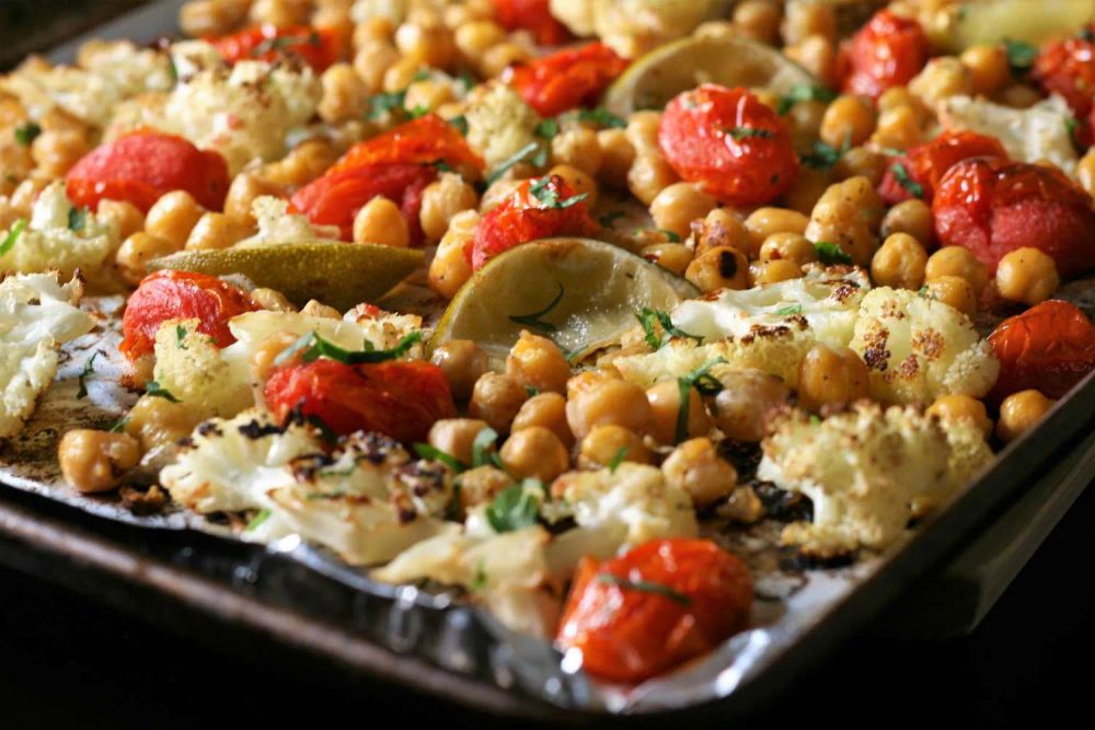 Easy Vegan Sheet Pan Roasted Cauliflower, Tomatoes, and Garbanzo Beans