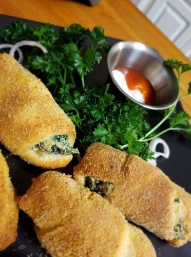 Spinach and Artichoke Dip-Stuffed Crescent Rolls