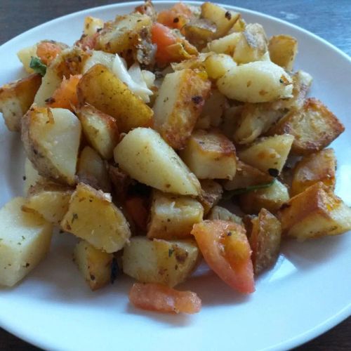 Roasted Potatoes with Tomatoes, Basil, and Garlic