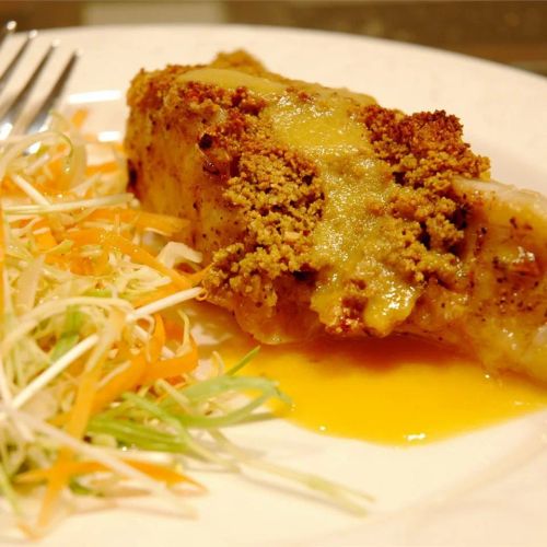 Macadamia-Crusted Sea Bass with Mango Cream Sauce