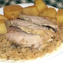 Slow Cooker German-Style Pork Roast with Sauerkraut and Potatoes