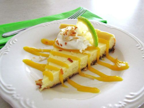 Coconut-Lime Cheesecake with Mango Coulis