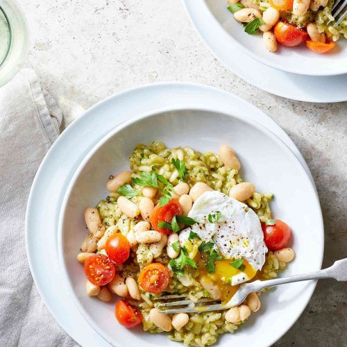 Pesto Risotto with Cannellini Beans, Tomatoes, and Poached Eggs