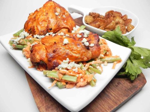 Grilled Buffalo Chicken Thighs with Blue Cheese Slaw